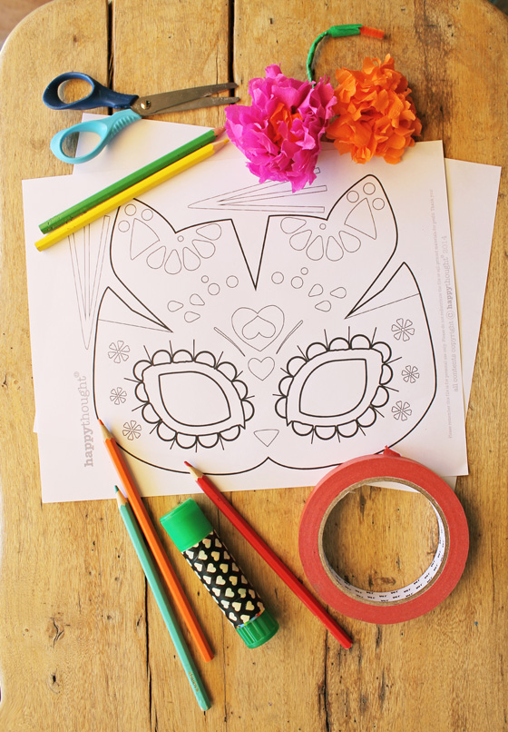 sugar skull cat mask for el dia los Muertos or Day of the Dead. 