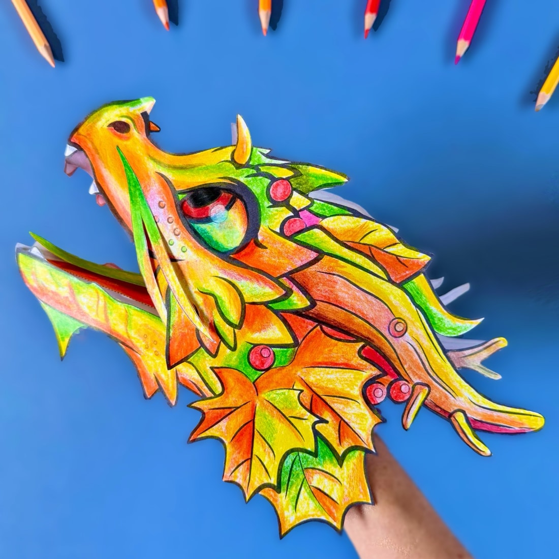 Color and create Paper Dragon Puppet Sassafras