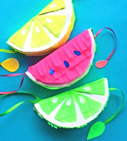 Make these cute DIY fruity pinatas for 5 de Mayo decorations