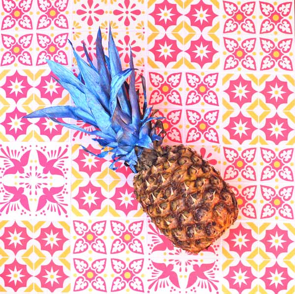 Paint the leaves on your pineapple to make the perfect decoration centrepiece